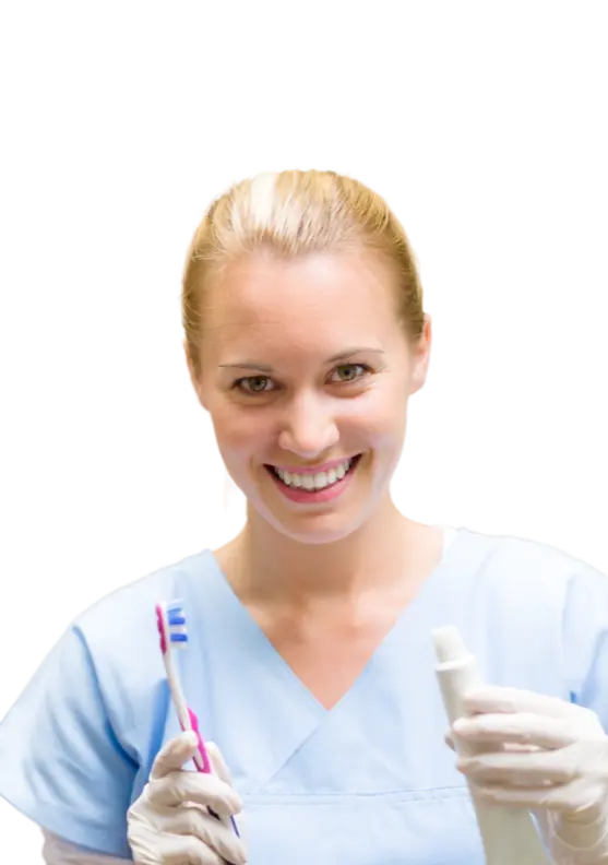 Dental hygienist in scrubs holding a toothbrush and toothpaste